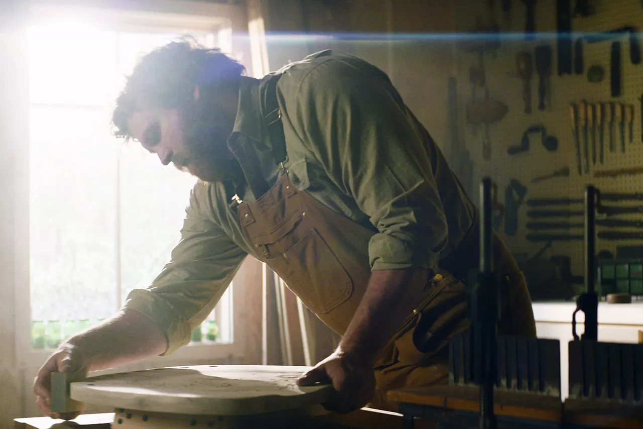 Image of a man crafting quality furniture
