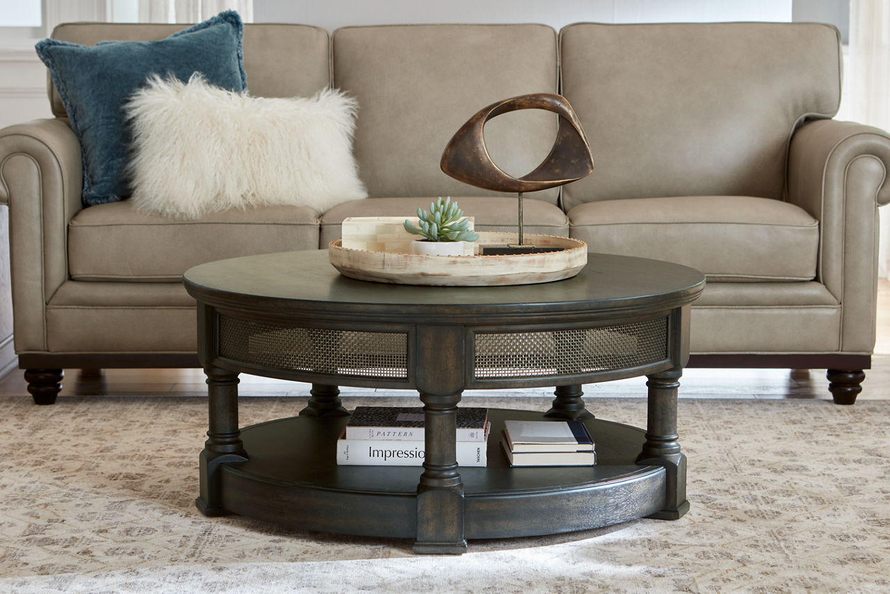 The Aberdeen round coffee table in room scene.