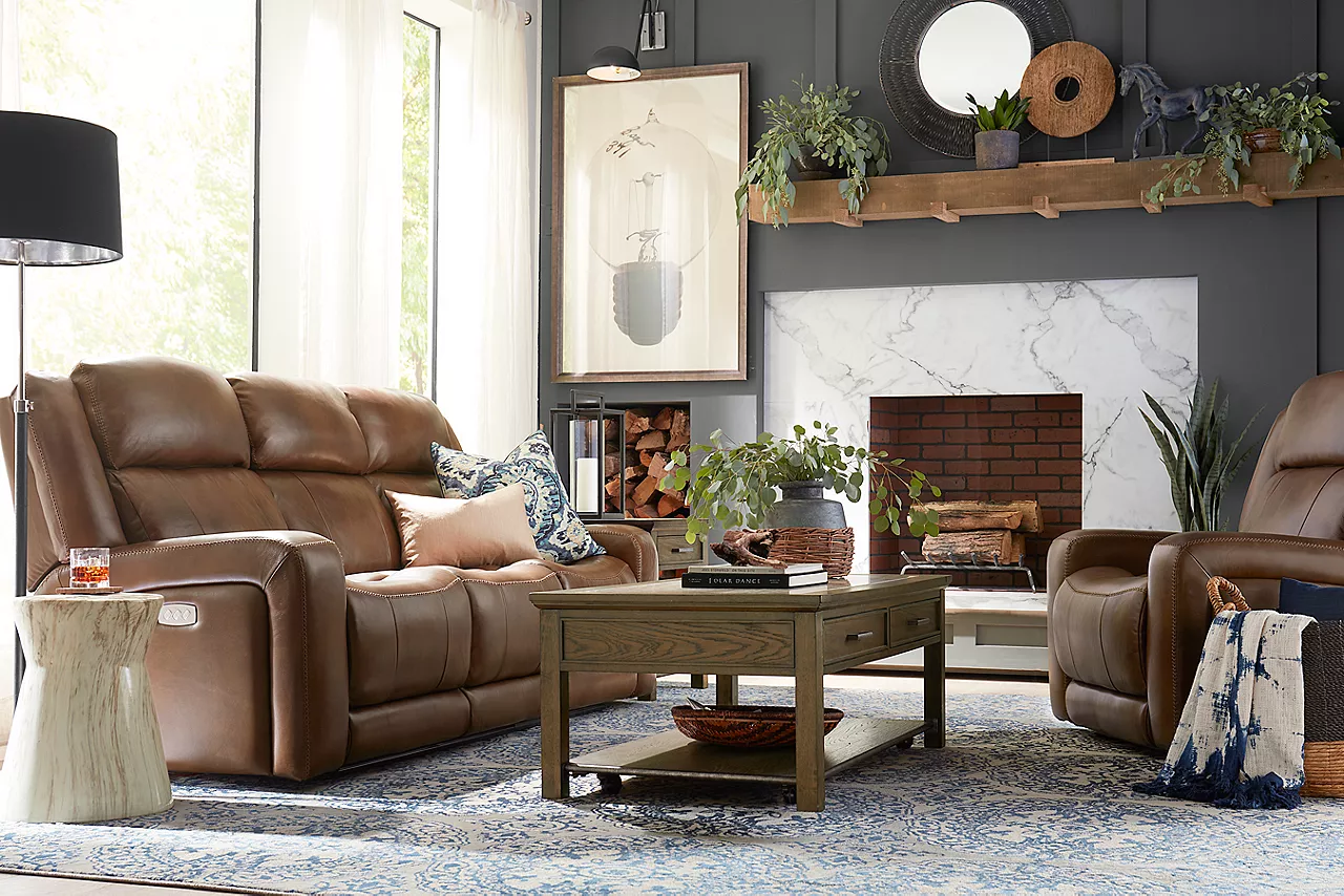 Aviator Sofa and Recliner in Caramel in a room scene.