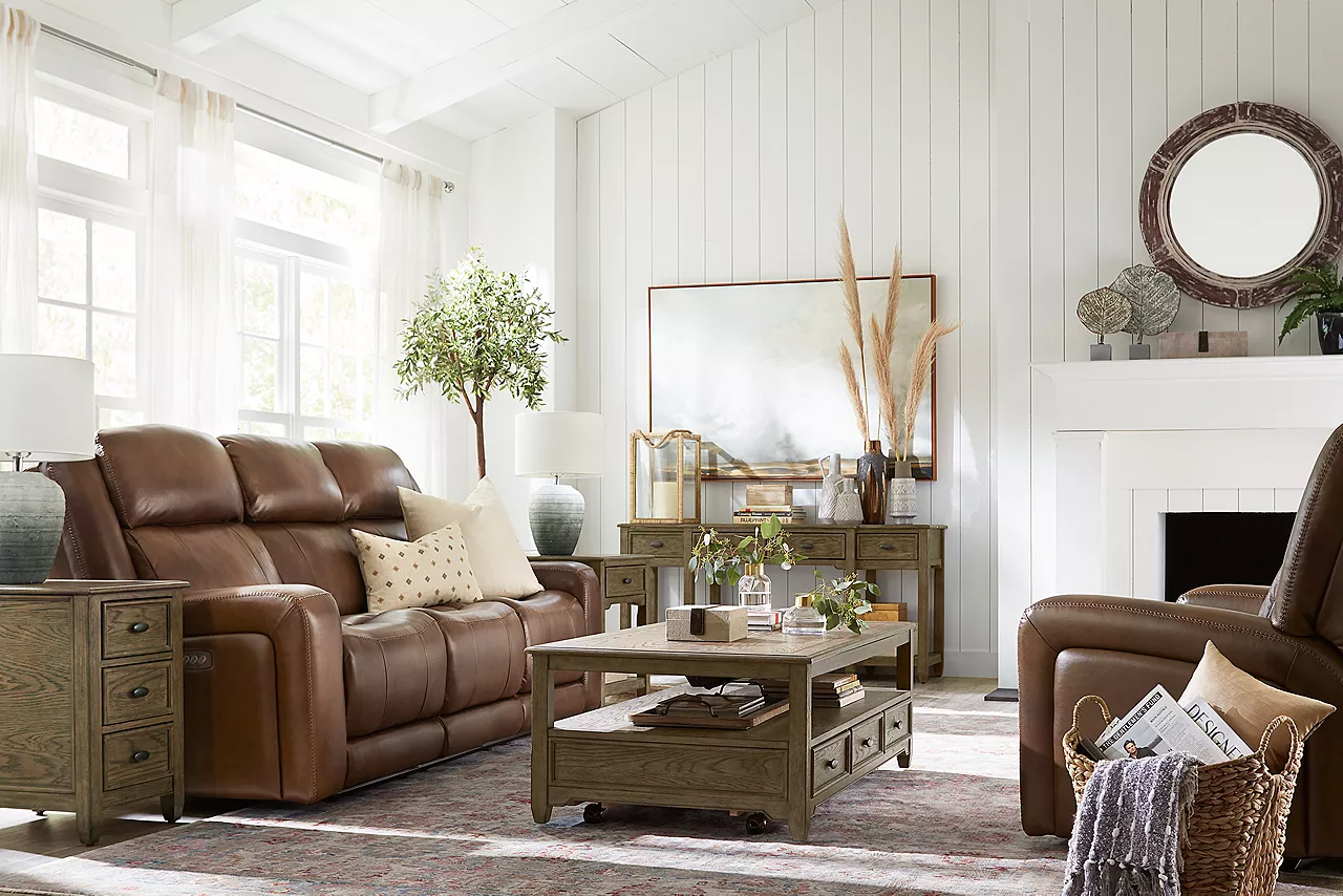 Aviator sofa and Recliner in Caramel in a room scene.