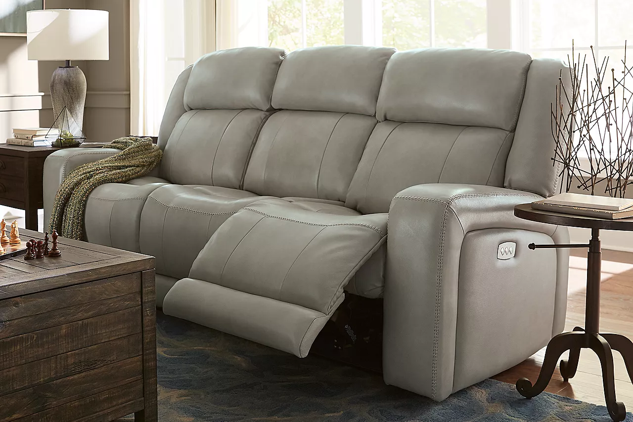 Aviator Sofa in Prescott Taupe with one side of the sofa reclined in a room scene.
