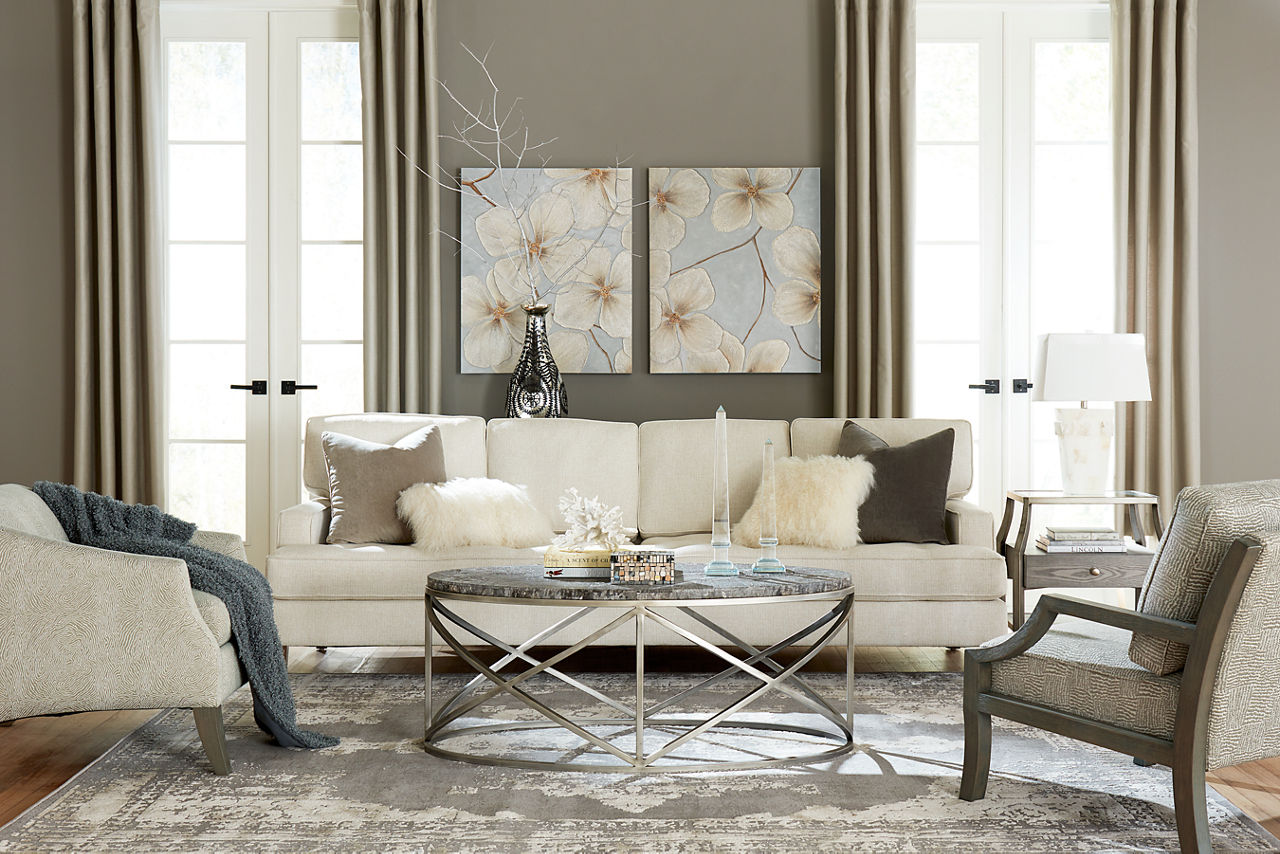 Gianna Conversation Sofa in Bermuda Natural, Gianna Chair in Tangle Linen, and Gianna Accent Chair in Daddio Jute in a room scene.