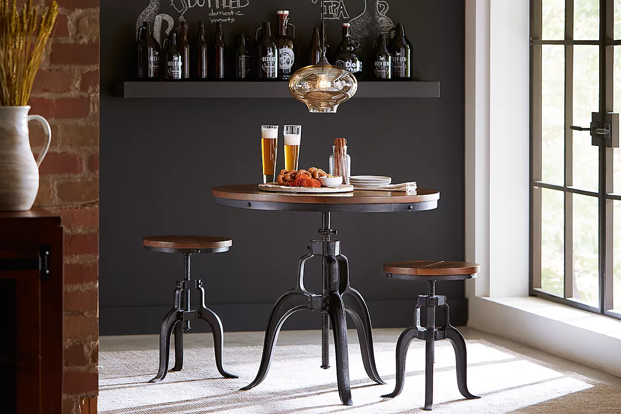 River City Round Table a Stools in Walnut  in a room scene.