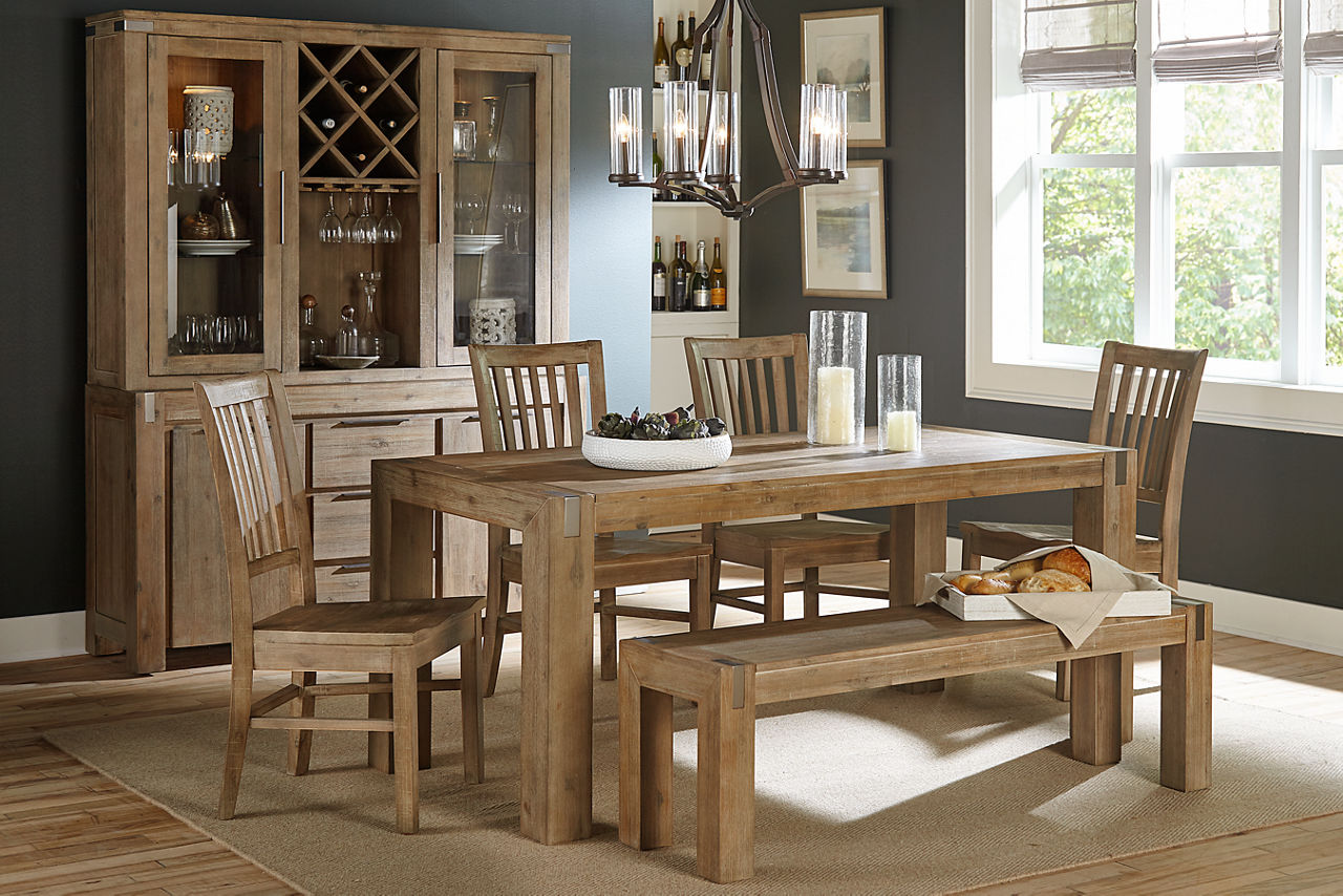 Sherman Dining Table, Chairs, Bench and Buffet in Driftwood in a room scene.