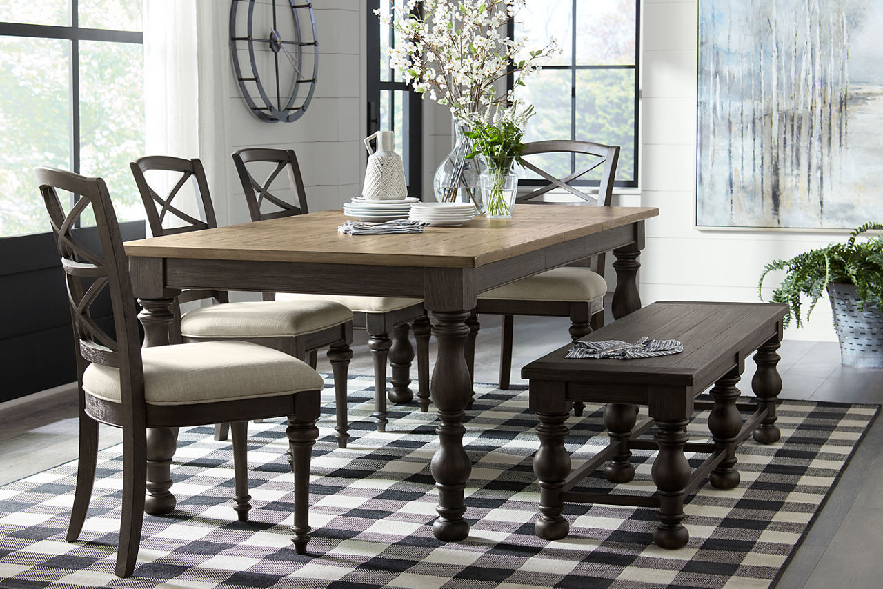 Barrington Dining Table in Antique Oak/Matte Black and Dining Chairs and Bench in Matte Black in a room scene.