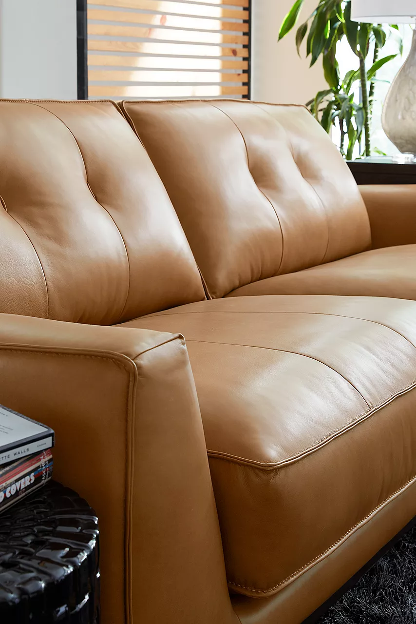 Phoenix sofa in Caramel in a room scene.