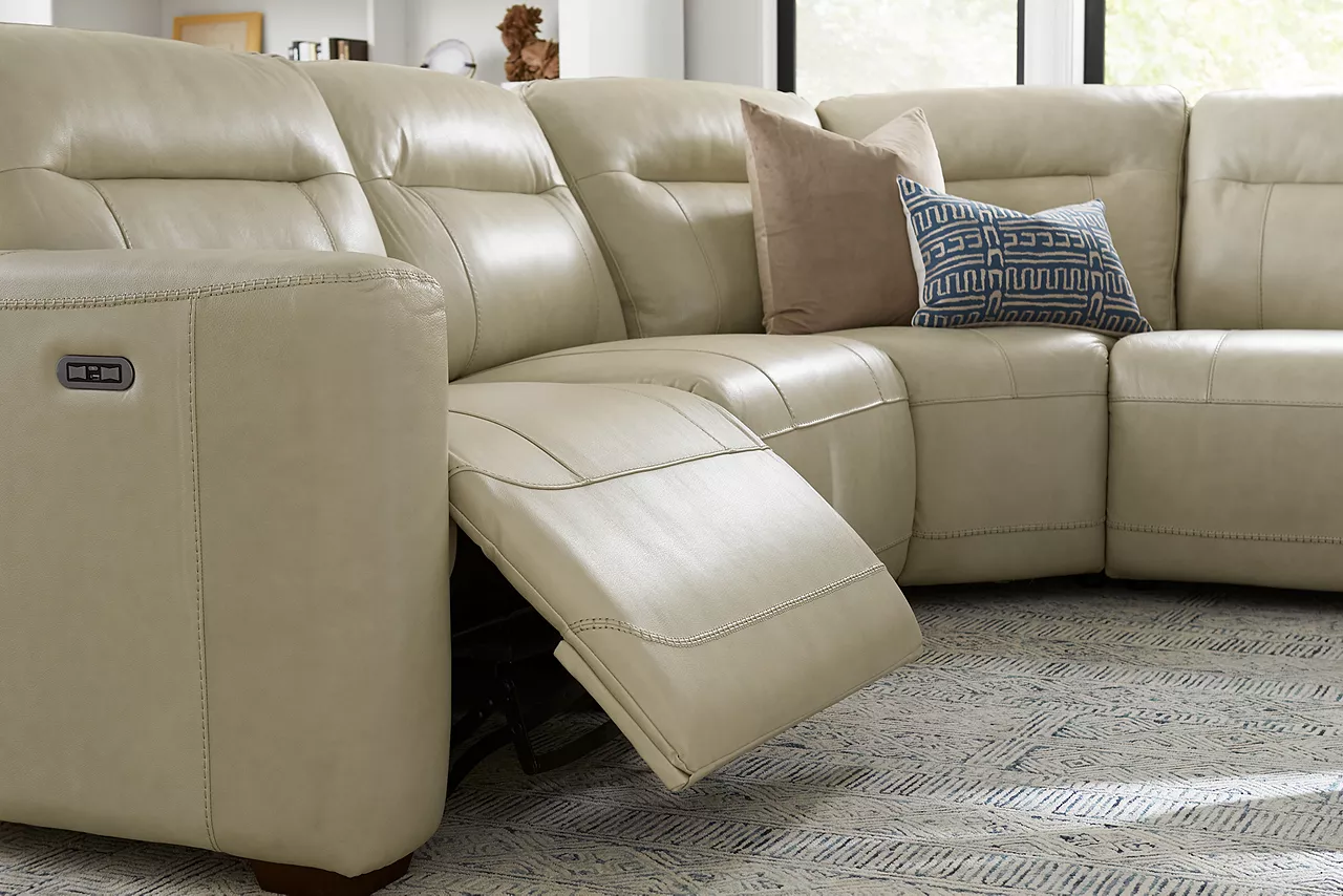 Melbourne Sectional in Ice with one end reclined.