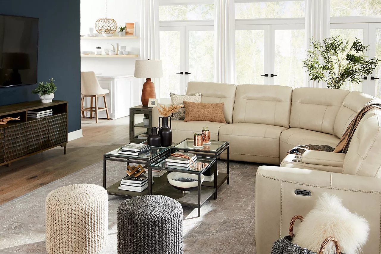 Melbourne Sectional in Ice and Keaton Bunching Coffee Table and Knox Entertainment Console in a room scene.