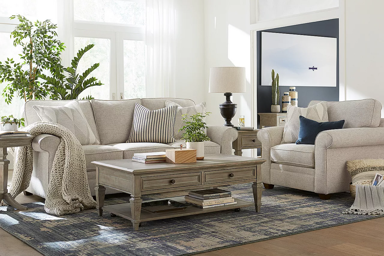 Sandy Sofa and Chair in Linen and Berkley Coffee, End and Chairside Tables in Dovetail Grey in a room scene.