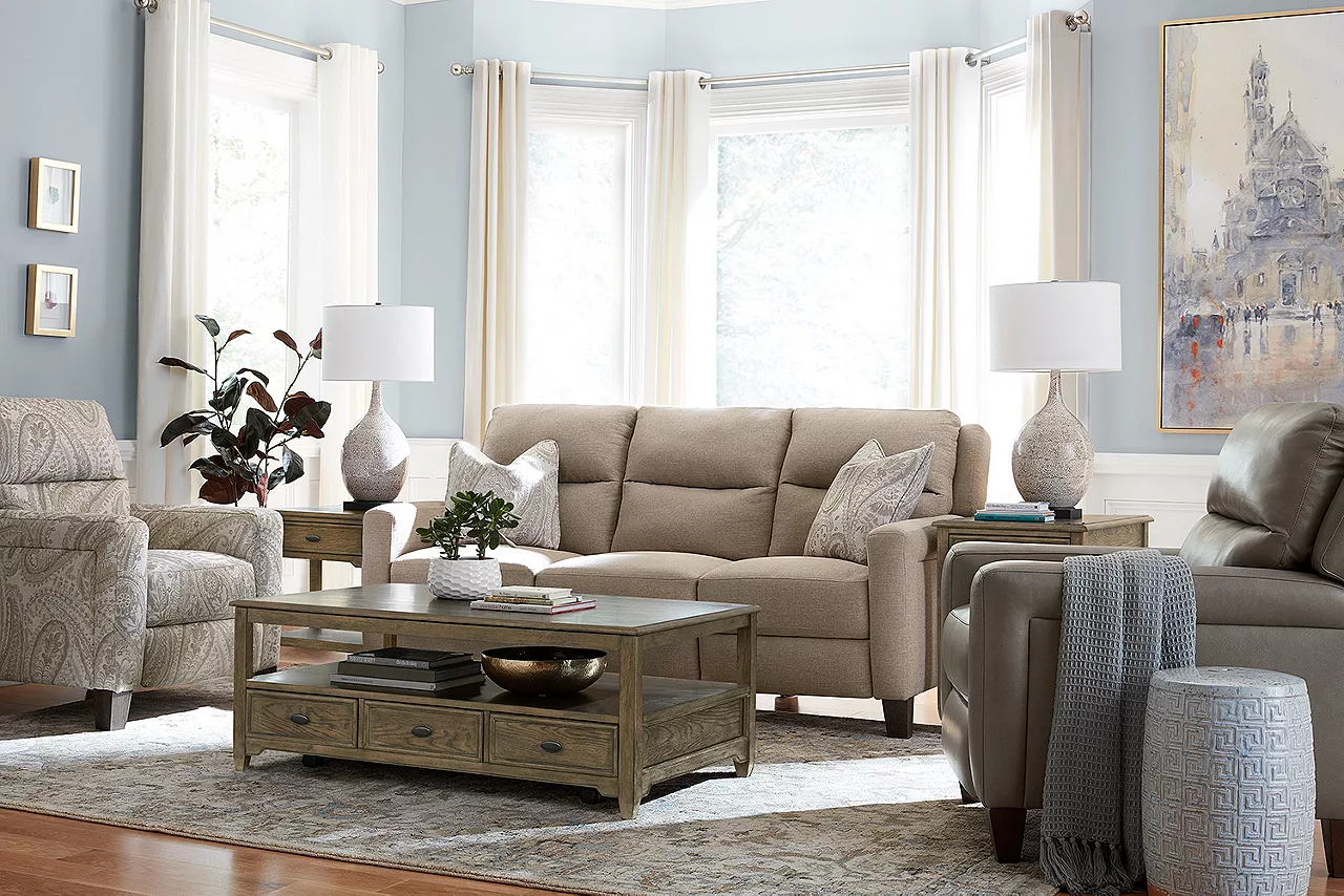 Ava Sofa in Knox Oatmeal, Ava Accent Recliner in Manchester Mineral, and Ava Recliner in Fresca Cobblestone in a room scene