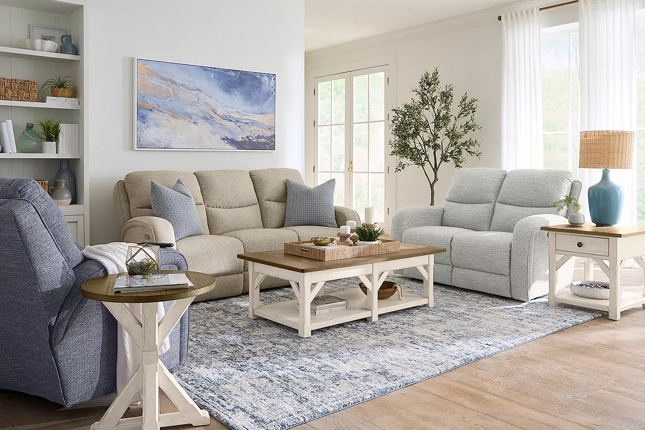 Samantha power sofa in pandora khaki, loveseat in pandora robins egg and chair in pandora navy with Kyler occasional tables in a room scene