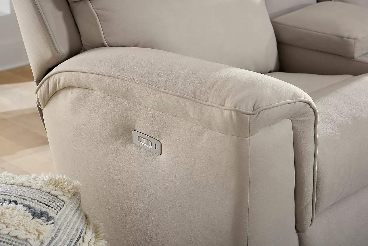 Detail of USB port and power reclining button on Aaron loveseat with console
