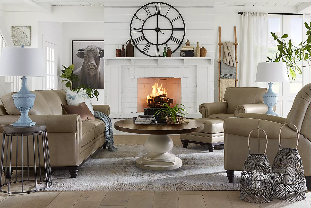 A Hartford Sofa, Chair, Recliner, and ottoman in Pebble in a room scene.