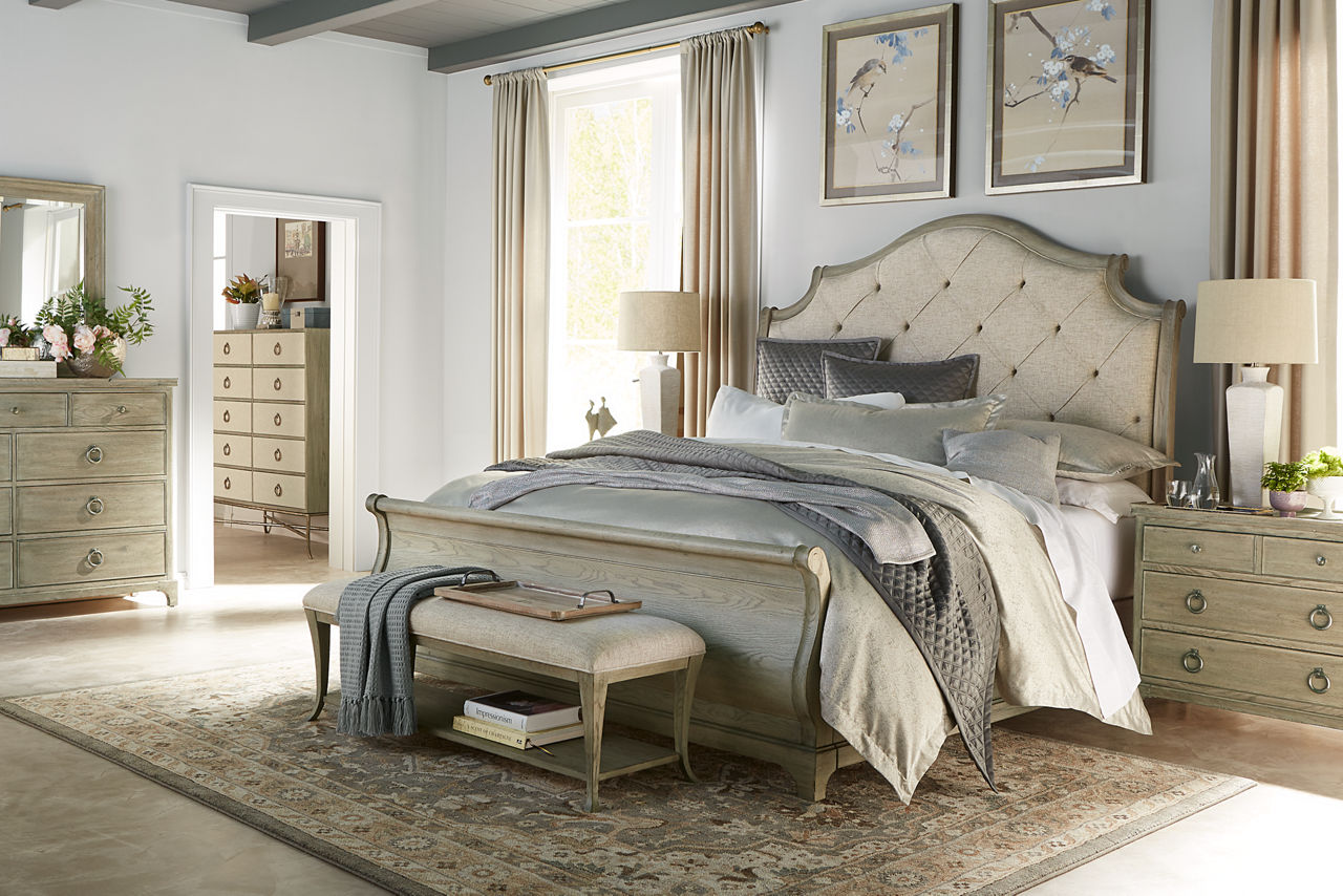 Candler Park Sleigh Bed, Nightstand, Bench, Dresser with Mirror, and  Chest in Burnished Grey in a room scene.
