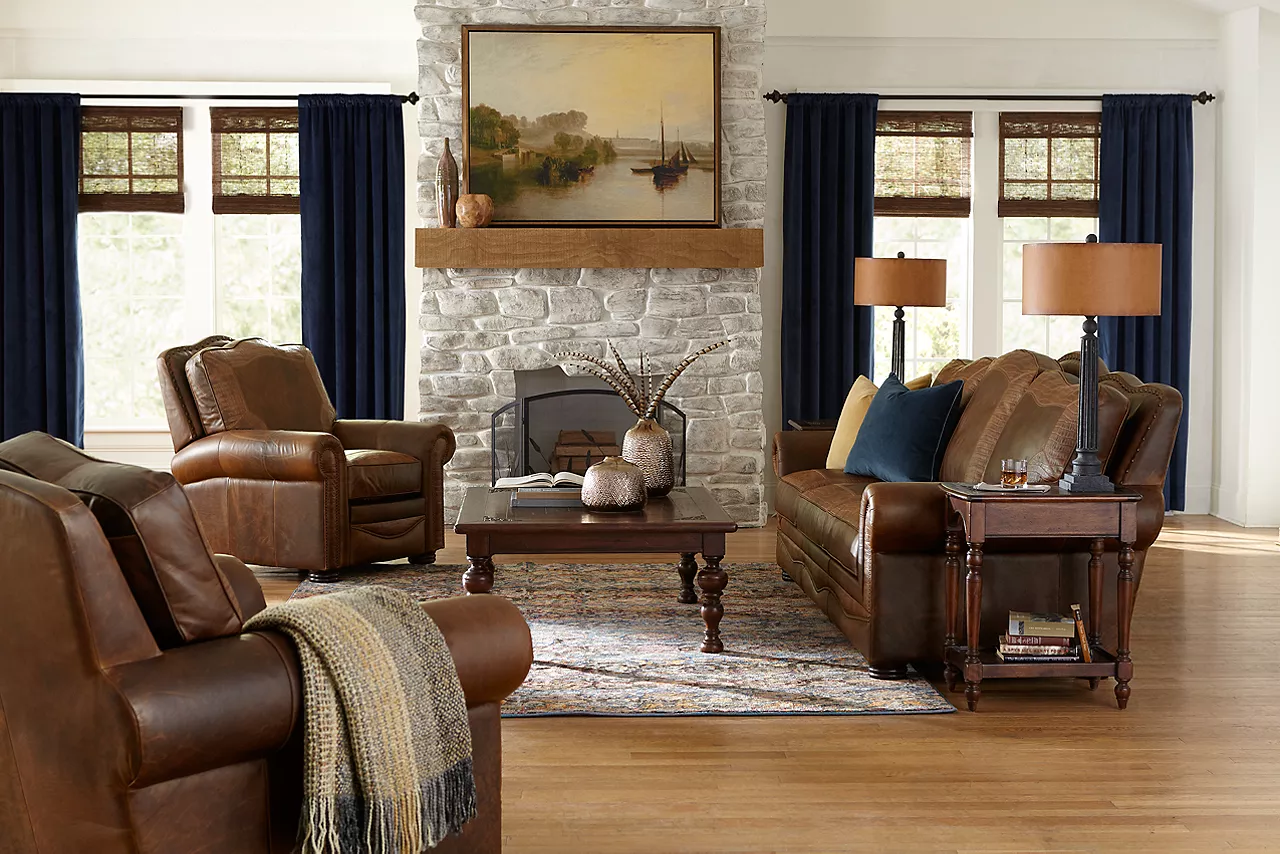 Dakota Sofa, Chair, and Recliner in American Bison Walnut- Tooled in a room scene.