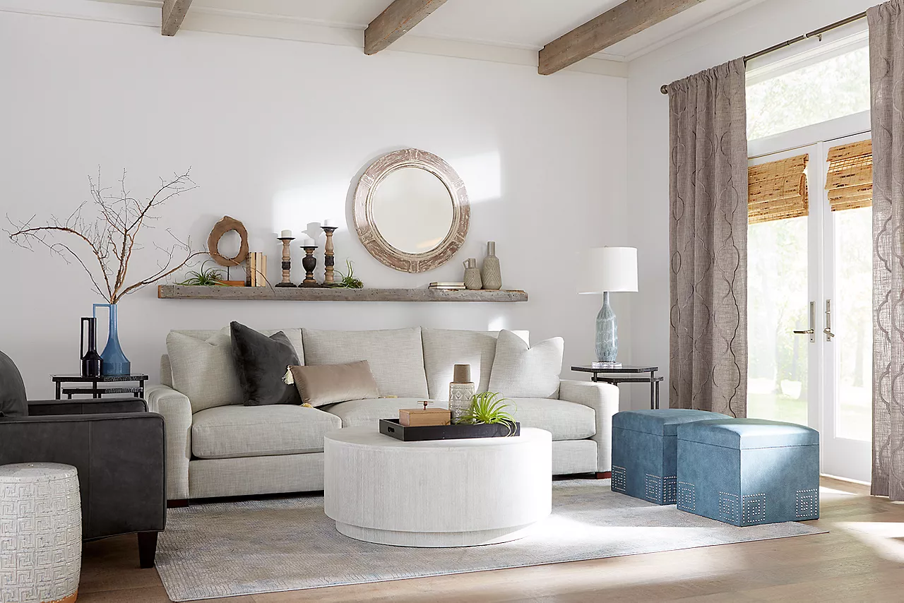 Destinations 3-Seat Sofa in Convert Ivory and Ginny Coffee Table in White Washed in a room scene.