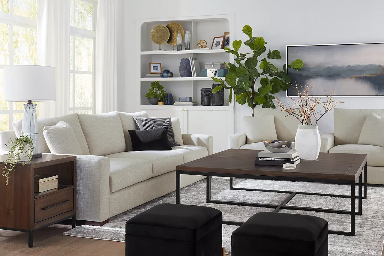 Destinations 3-Seat Sofa and Swivel Chairs in Convert Ivory in a room scene.