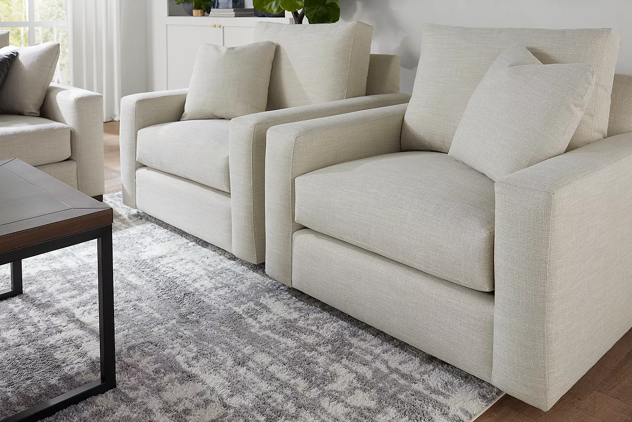 Destinations 3-Seat Sofa and Swivel Chairs in Convert Ivory in a room scene.