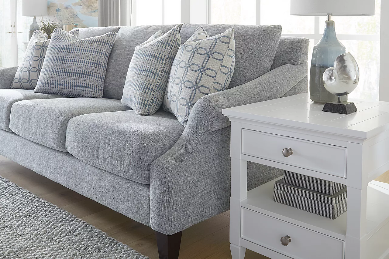 Gigi Sofa in Hornet Silverpine and an Arlington end table in a coastal room scene.