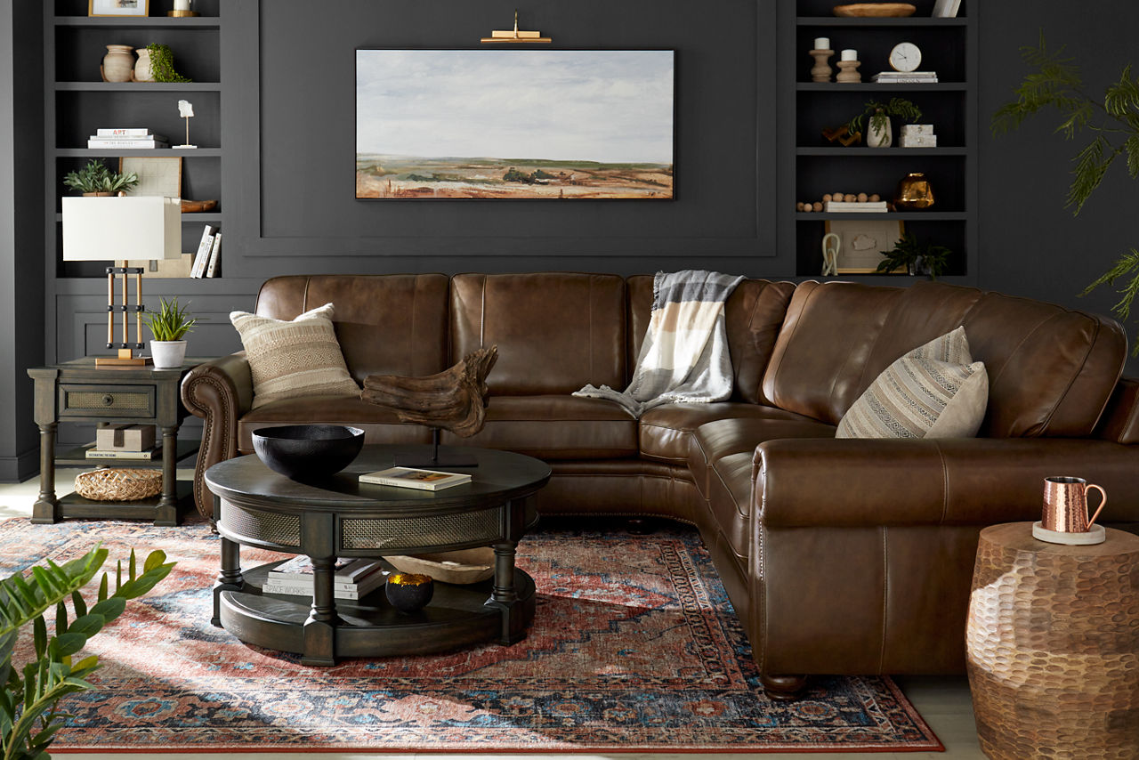 Alexander Sectional featuring the Aberdeen occasional living room set on the Carina Spice rug