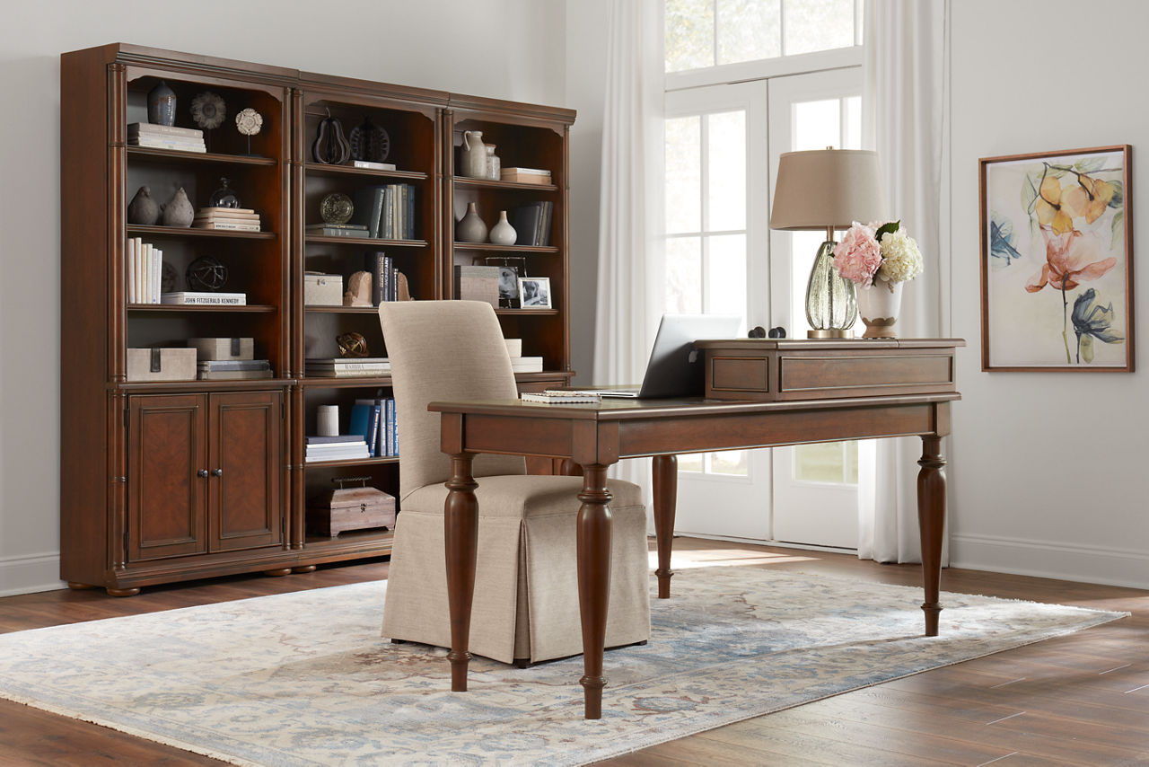 The Martin's Landing writing desk and bookcase in room scene.
