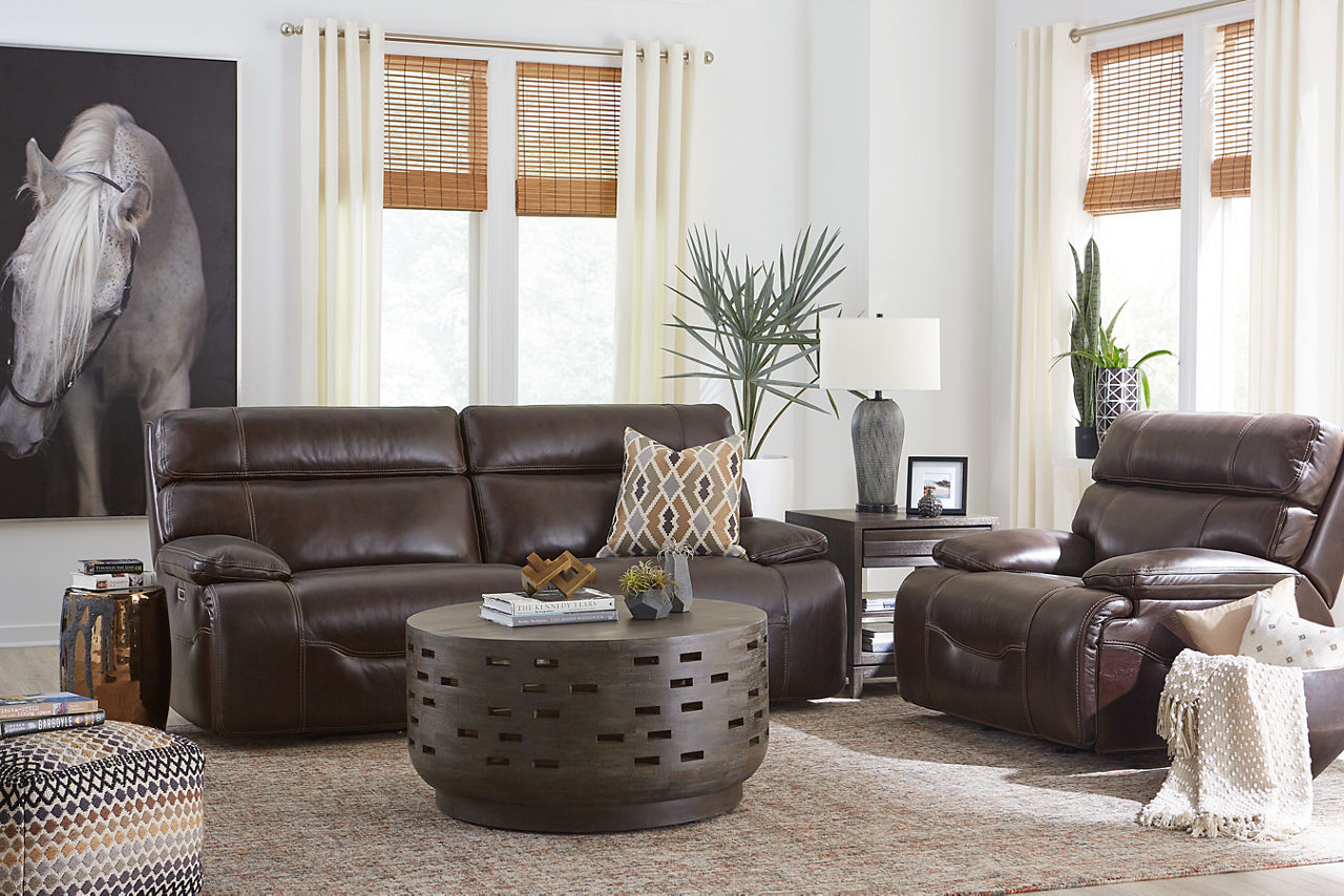 Denver Sofa and Glider Recliner in Coffee in a room scene.