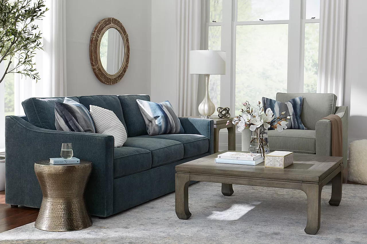 Shiloh sofa in Contessa Shadow and swivel chair in Contessa Dove in a room scene.