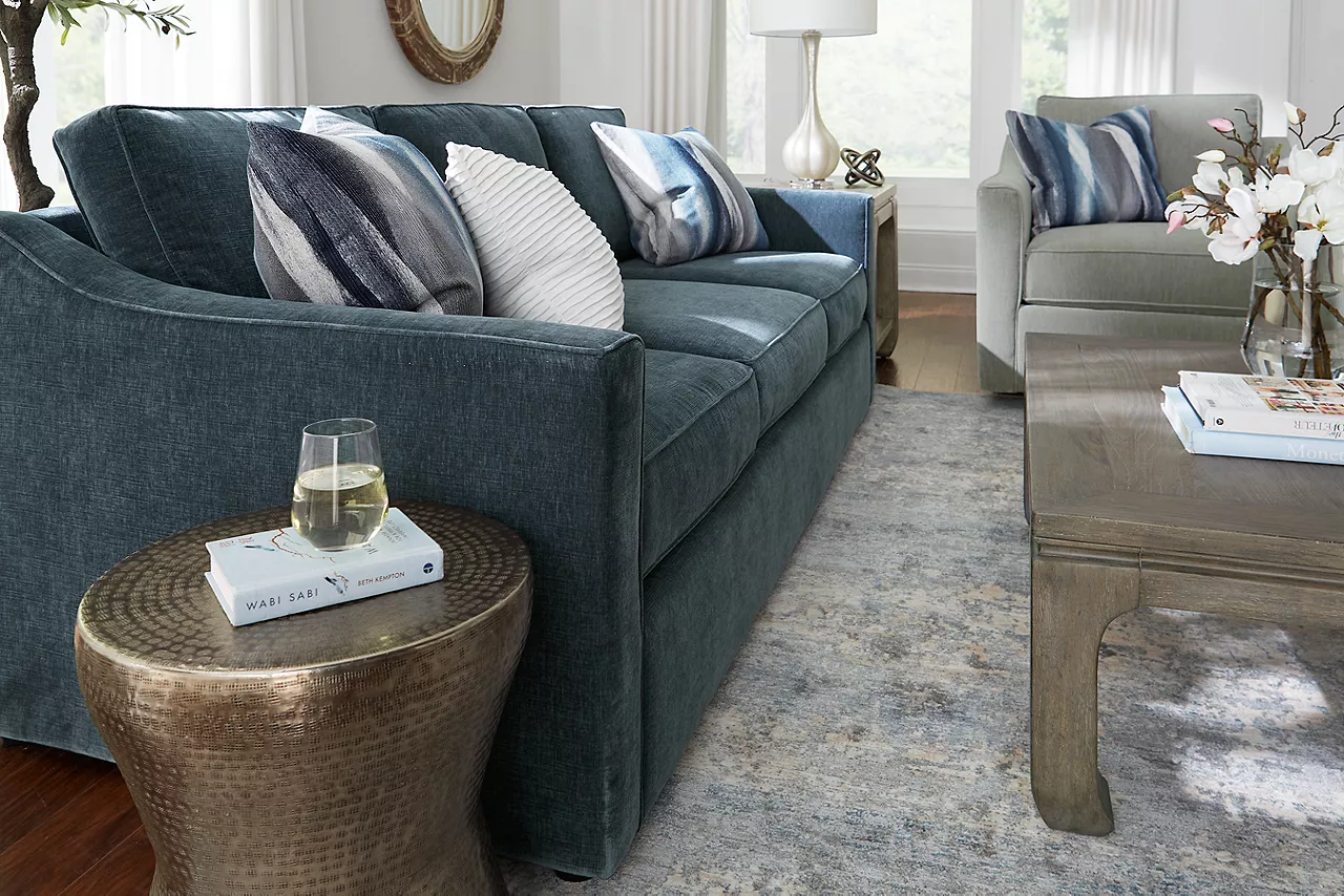 Shiloh sofa in Contessa Shadow and swivel chair in Contessa Dove in a room scene.