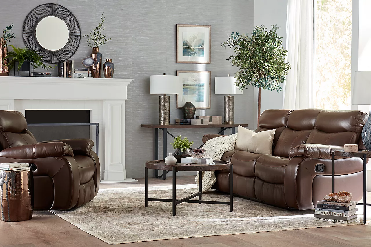 Wrangler sofa and recliner in Cognac with a Knox coffee, end, and console table in a room scene.