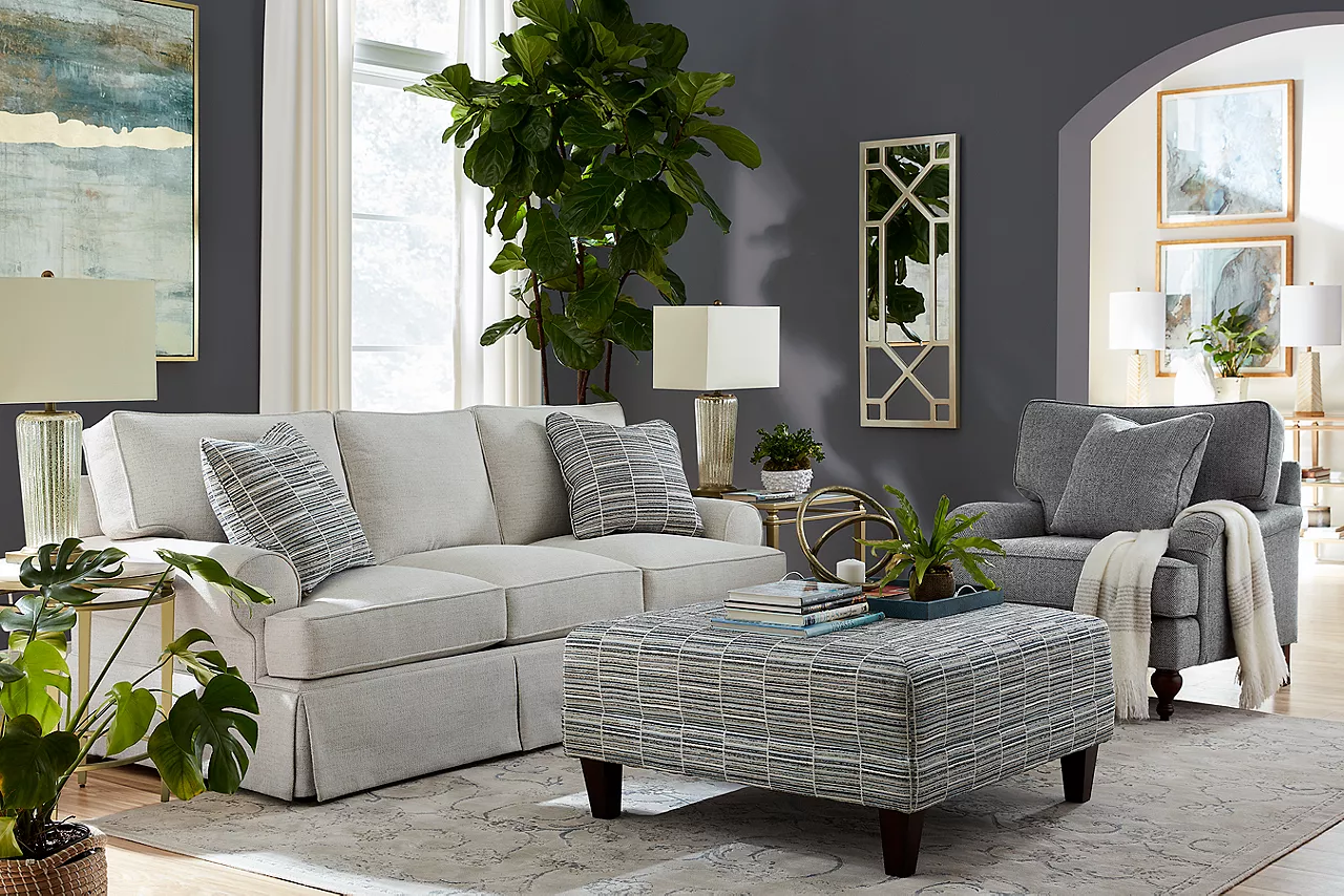 Erin 3-Seat Sofa in Chelsea Snow, Cocktail Ottoman in Byzantine Storm, and Matching Chair in Tumbling Waters in a room scene.