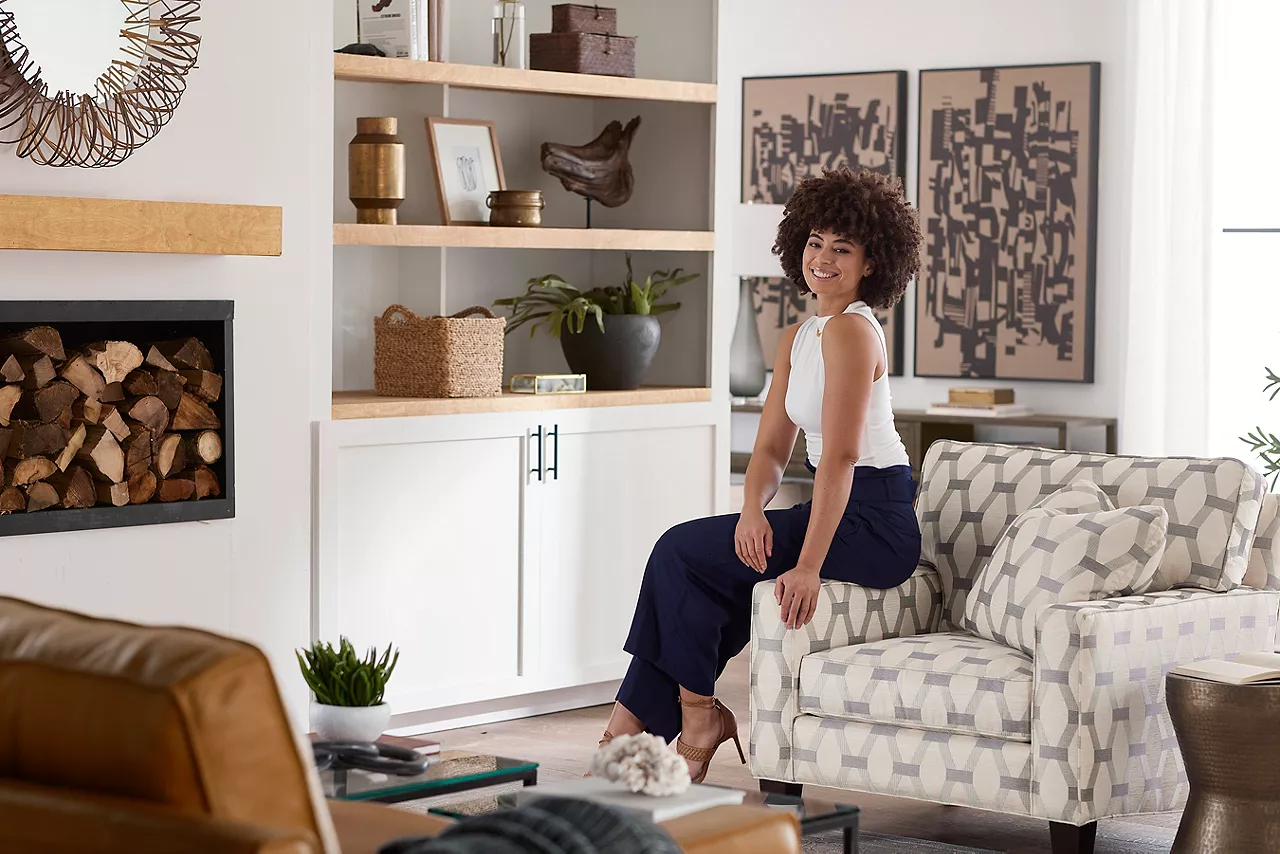 Image of Havertys customer enjoying her new furniture