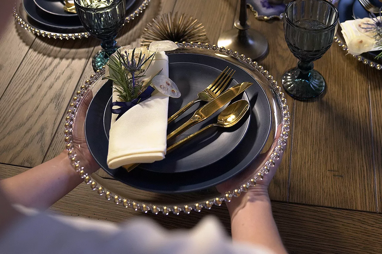 Overhead shot of flatware and a plate