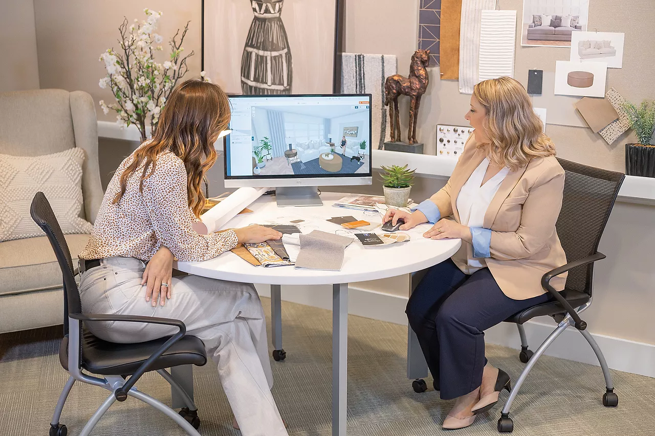 Image of Design Expert working with a customer