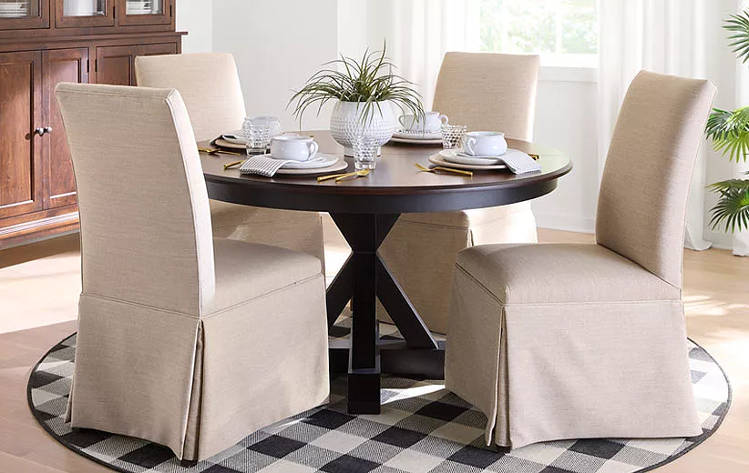 Table with chairs with dining place settings